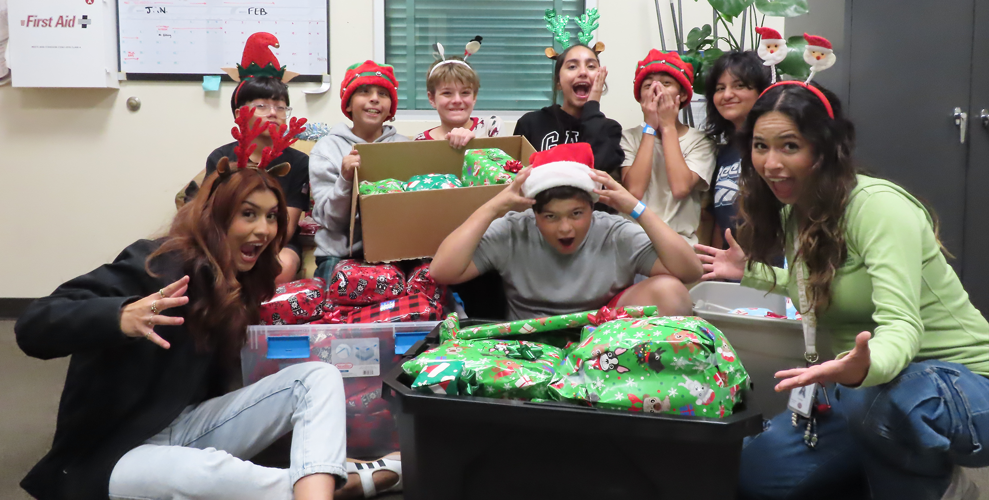 REC Club teens finish wrapping gifts for Ring and Run event