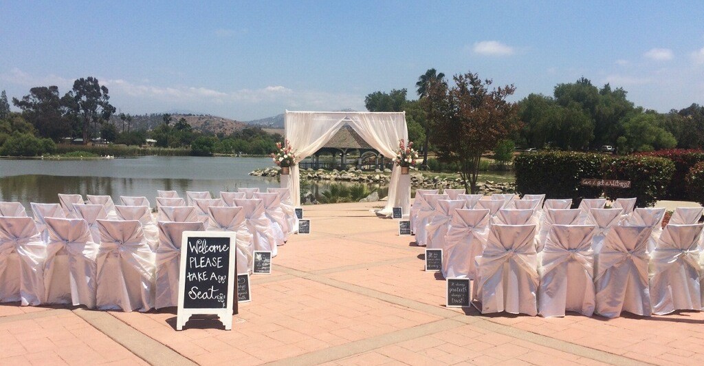Wedding ceremony on a patio overlooking the lake 