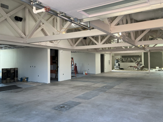 Interior view of drywall and lighting installation.